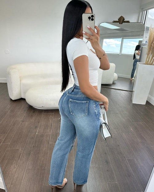 calça Denim com detalhes de cruz